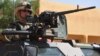French troops patrol in the streets of Gao on February 3, 2013 as France jets carried out major air strikes today near Kidal.