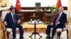 Turkish Prime Minister Ahmet Davutoglu, left, and the leader of the main opposition Republican People's Party, CHP, Kemal Kilicdaroglu during a meeting in Ankara, Turkey, July 13. 2015. 
