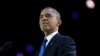 President Barack Obama pauses as he speaks at the election night party at McCormick Place in Chicago, early Wednesday, Nov. 7, 2012.