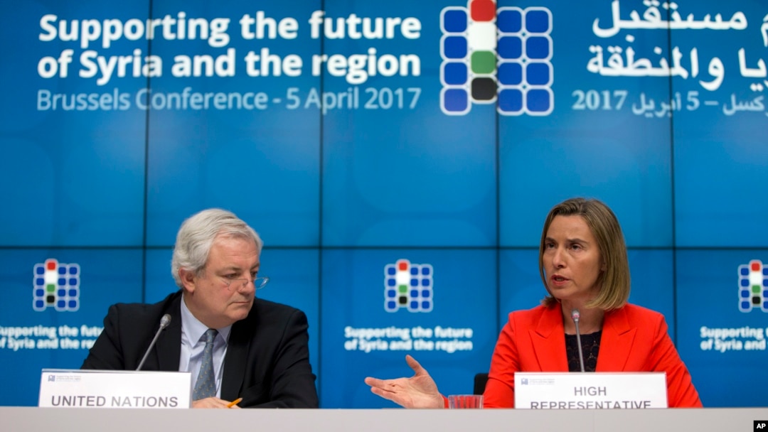 European Union foreign policy chief Federica Mogherini, right, and U.N. Office for the Coordination of Humanitarian Affairs Greg O'Brien, left, address a media conference at an EU Syria conference at the Europa building in Brussels, Belgium, April 5, 2017.