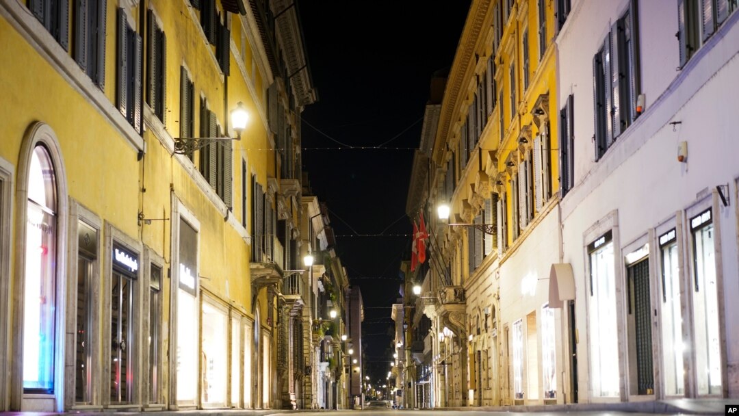 As the the national night time curfew goes into effect late Friday due to new coronavirus measures the shops and streets are empty in Rome, Italy, early Nov. 7, 2020.