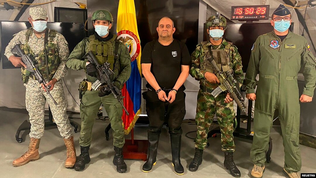 Dairo Antonio Usuga "Otoniel" David is photographed with Colombian military soldiers after being captured, in Necocli, Colombia, October 23, 2021.