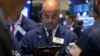 Traders work on the floor of the New York Stock Exchange Sept. 11, 2015.