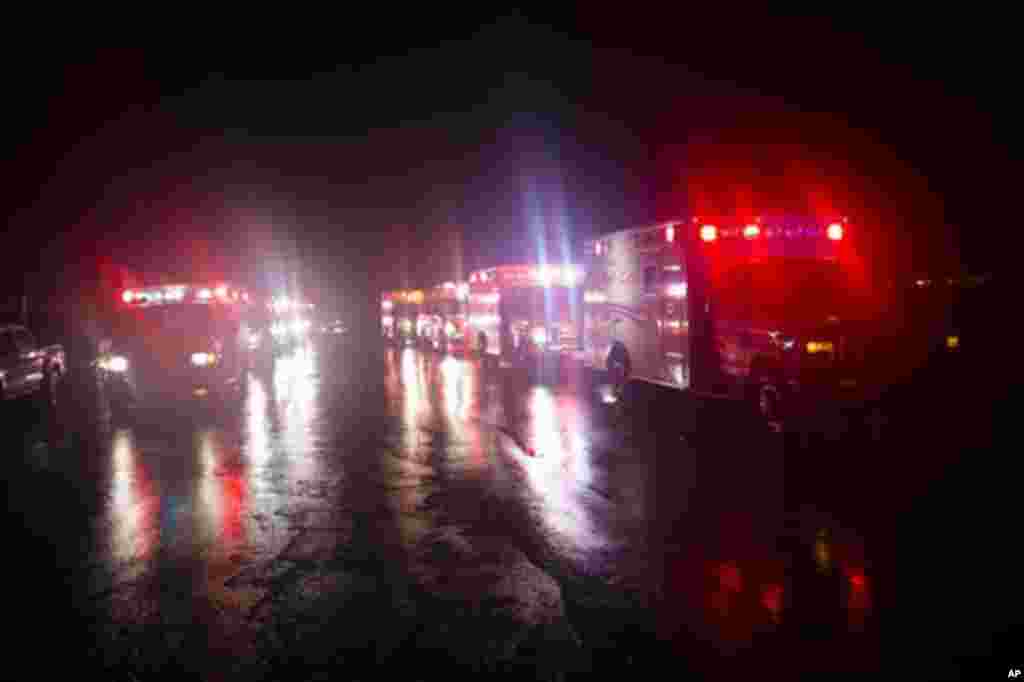 Ambulances line up outside New York University Tisch Hospital during an evacuation of the hospital after its backup generator failed when the power was knocked out by Sandy, October 29, 2012.