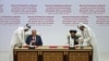 U.S. Special Representative for Afghanistan Reconciliation Zalmay Khalilzad and Taliban deputy chief for political affairs Mullah Abdul Ghani Baradar sign the U.S.-Taliban peace agreement during a ceremony in the Qatari capital Doha, Feb. 29, 2020.
