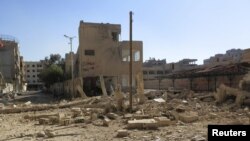 A view of rubble and damaged buildings after what activists said was shelling by forces loyal to Syria's President Bashar al-Assad, Daraya, Feb. 4, 2013.