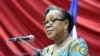 FILE - Transitional president of the Central African Republic, Catherine Samba Panza, gives a speech in Bangui before members of the Conseil National de Transition, the transitional parliament, May 6, 2014. Samba Panza pleads with the international community to help develop the war-ravaged country. 