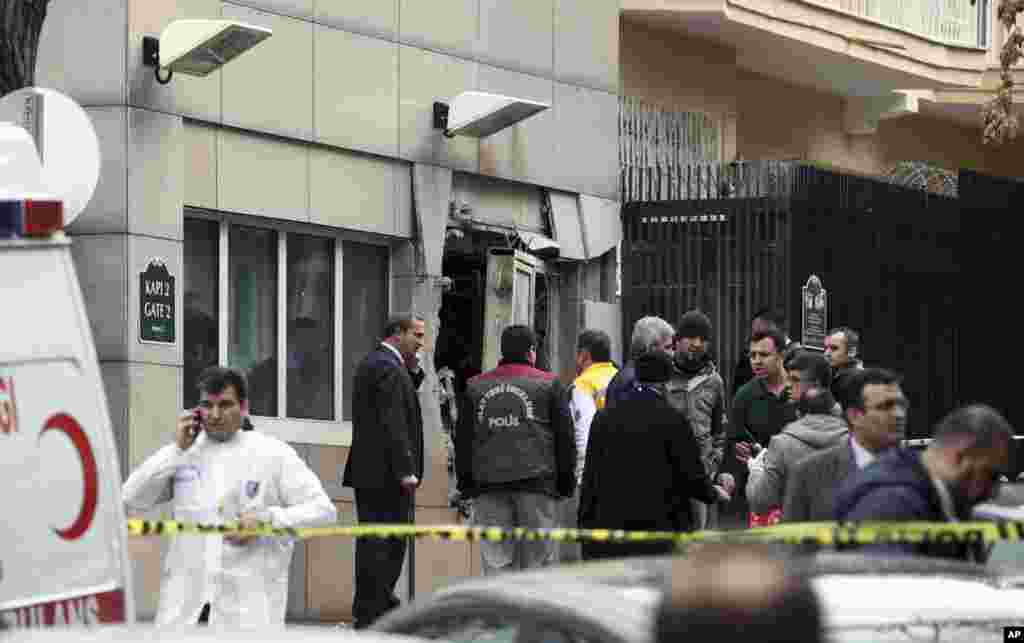 Emergency personnel are seen in front of a side entrance of the U.S. Embassy in the Turkish capital, Ankara, February 1, 2013.
