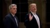 President Donald Trump, accompanied by House Majority Leader Kevin McCarthy of Calif., speaks to members of the media as they arrive for a dinner at Trump International Golf Club in in West Palm Beach, Florida, Jan. 14, 2018.