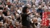 Anti-Morsi protesters chant anti-government slogans at Tahrir Square in Cairo, December 11, 2012.