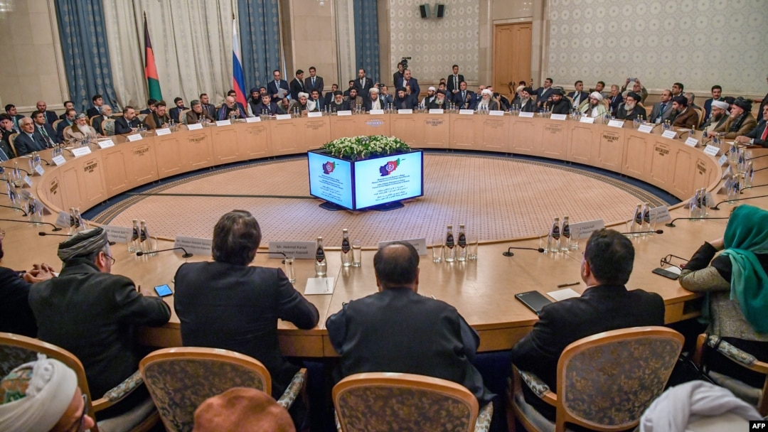 FILE - Participants attend talks between the Taliban and Afghan opposition representatives at the President Hotel, in Moscow, Russia, Feb. 5, 2019. 