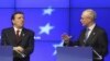 European Council President Herman Van Rompuy, right, and European Commission President Jose Manuel Barroso, address the media at the end of an EU summit, at the European Council building in Brussels, May 24, 2012. 