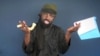 This screen grab image taken on February 18, 2015 from a video made available by Islamist group Boko Haram shows its leader, Abubakar Shekau, making a statement at an undisclosed location.