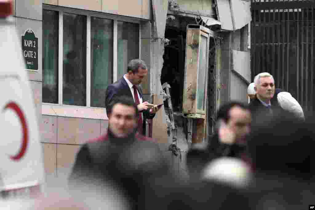 Emergency personnel in front of a side entrance of the U.S. Embassy in the Turkish capital, Ankara, February 1, 2013.