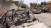Members of Iraqi rapid response force ride in a military vehicle during a battle against Islamic State militants in Mosul, Iraq, May 20, 2017. 